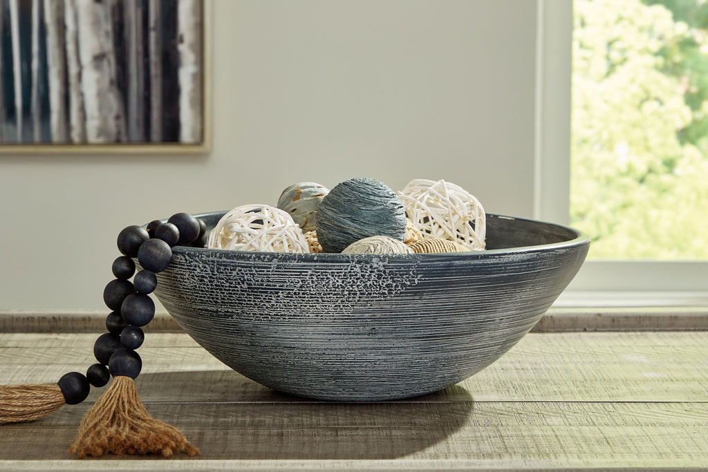Textured ceramic bowl with wide rim and dark gray finish