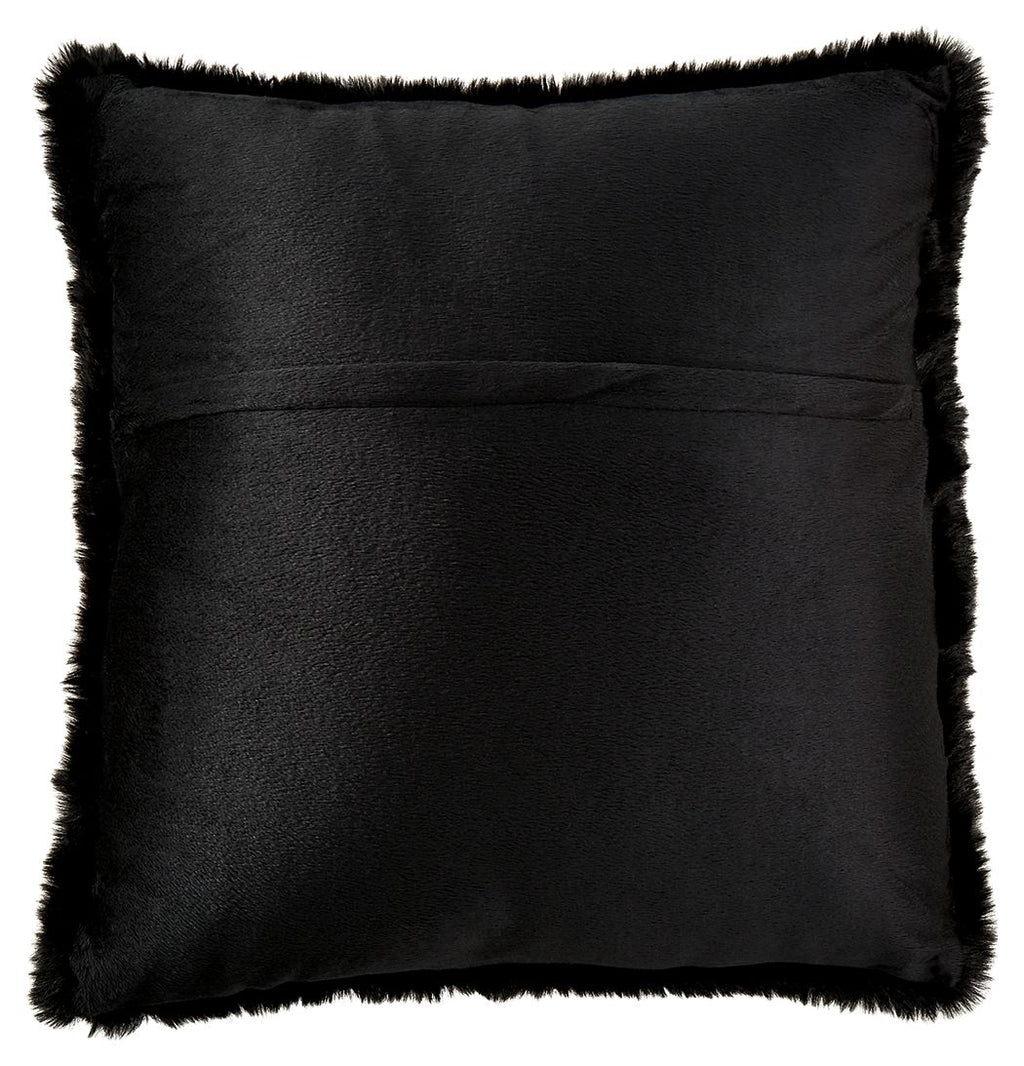 Black faux fur square pillow with fluffy trim around the edge.