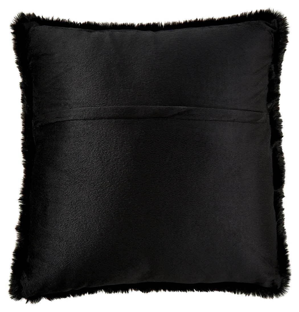Black faux fur square pillow with fluffy trim around the edge.