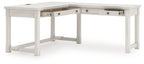 White home office desk with drawers across the front and open lower shelf