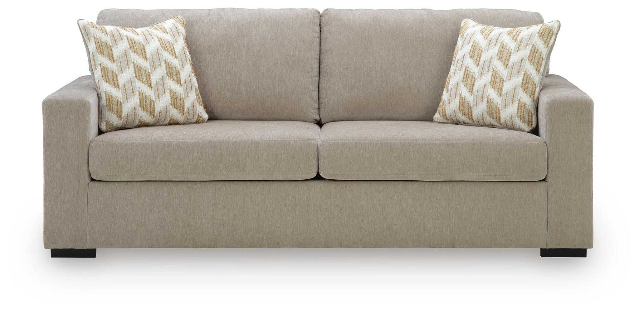 Light gray sofa sleeper with two patterned throw pillows and centered back seam