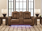 Power reclining loveseat with console, brown cushioned reclining seats