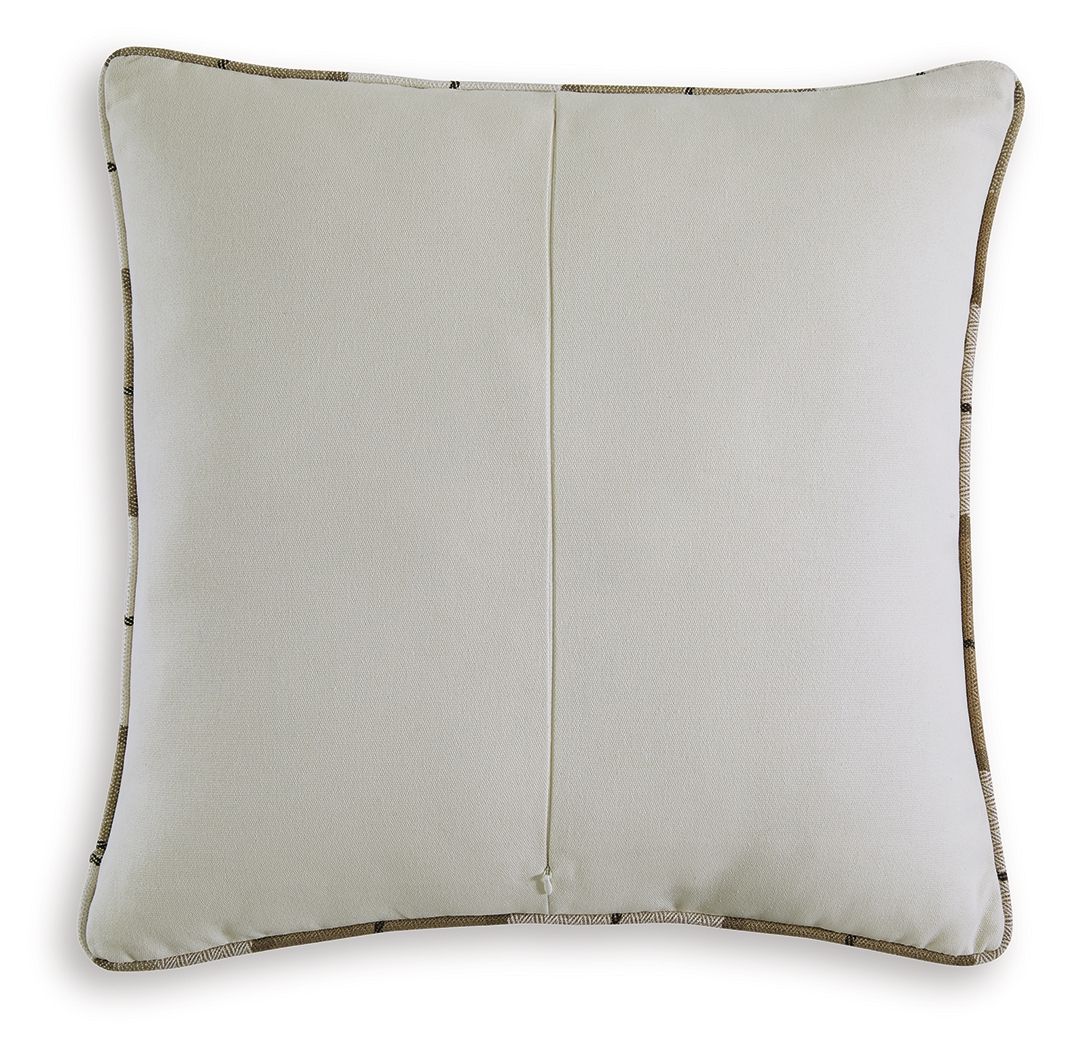 Solid cream pillow with dark piped border and stitched center seam
