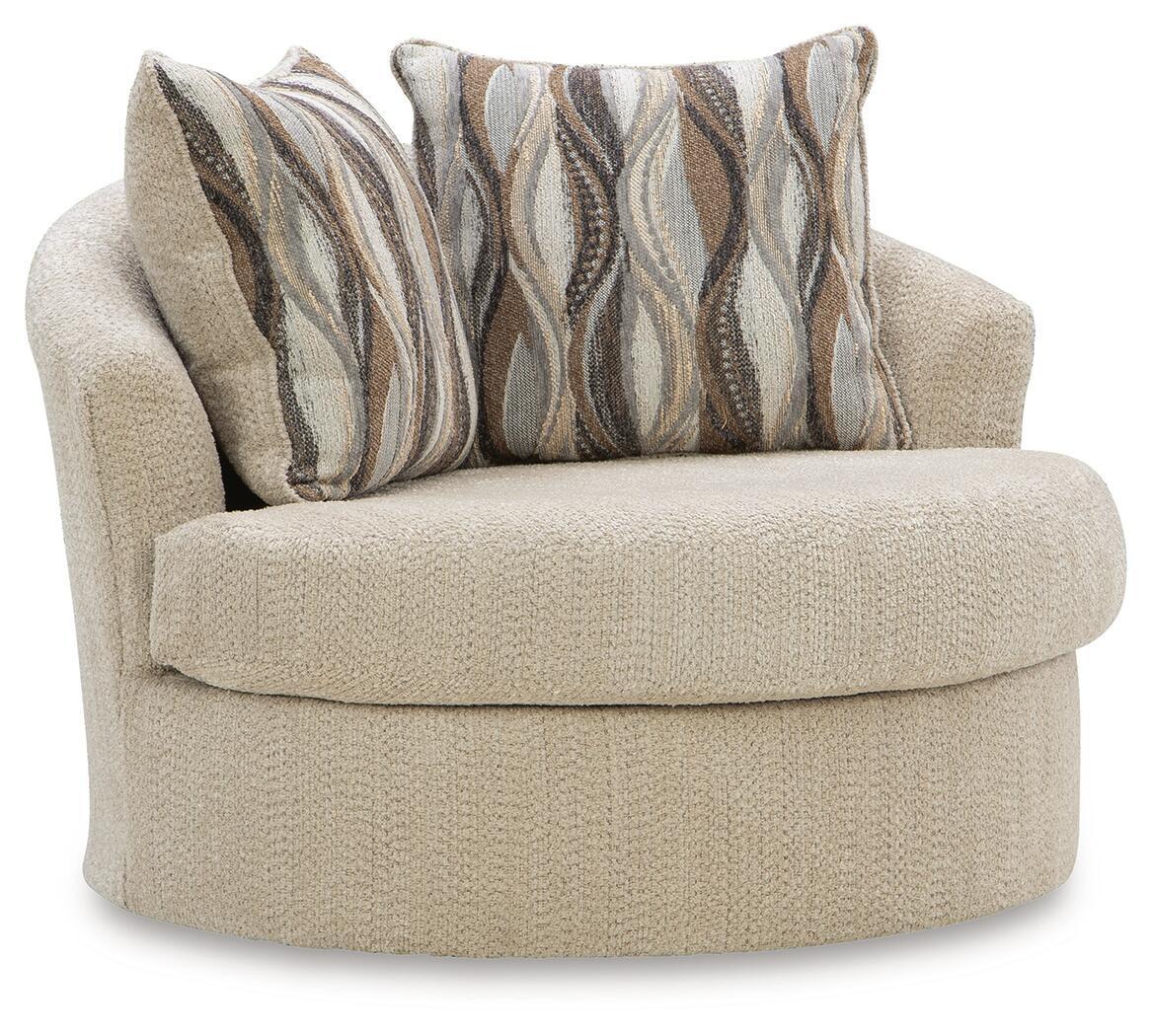 Beige swivel chair with rounded armrests and patterned back cushions