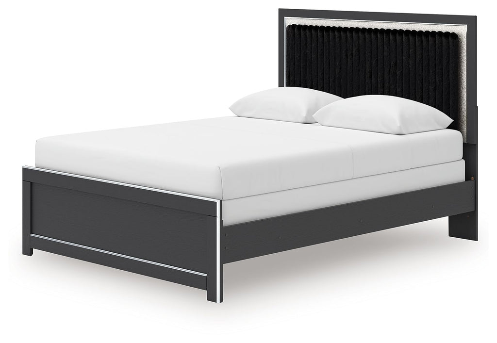Upholstered panel bed with white mattress, black upholstered headboard, and black side rails