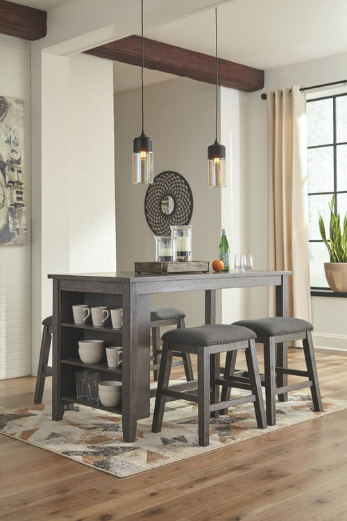 Gray rectangular counter table with four gray upholstered barstools