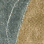 Upholstery fabric swatch with blue-green and tan woven texture