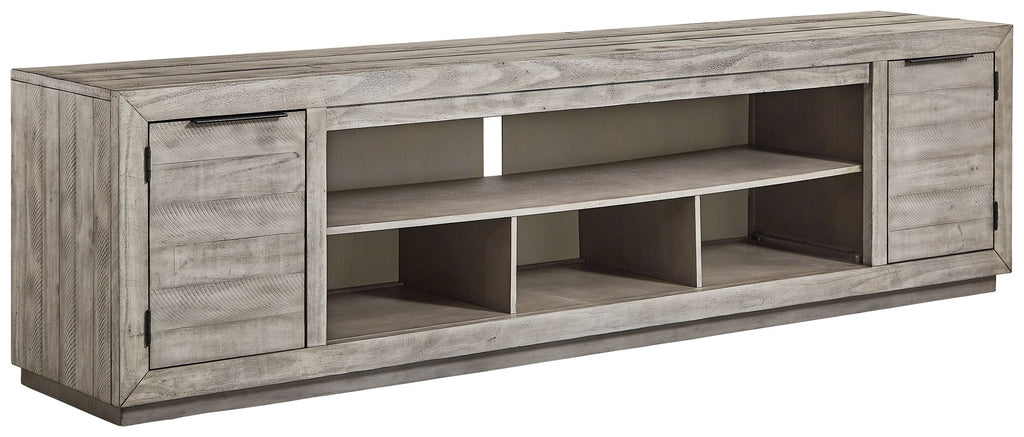 Gray TV stand with two cabinet doors and open shelving for media devices