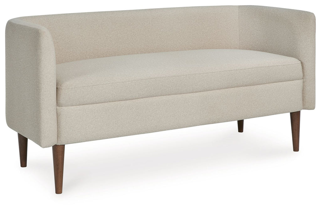 Beige upholstered accent bench with curved arms and low back, tapered wooden legs
