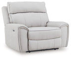 Light gray power recliner chair with padded arms and back, shown in front 3/4 view