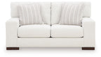 Frosted white loveseat with three back cushions, central seam, and striped pillows