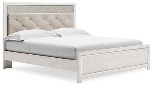 King upholstered panel bed with beige tufted headboard and white wood frame