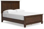 Dark brown panel bed with white mattress and two pillows, front-right angle.