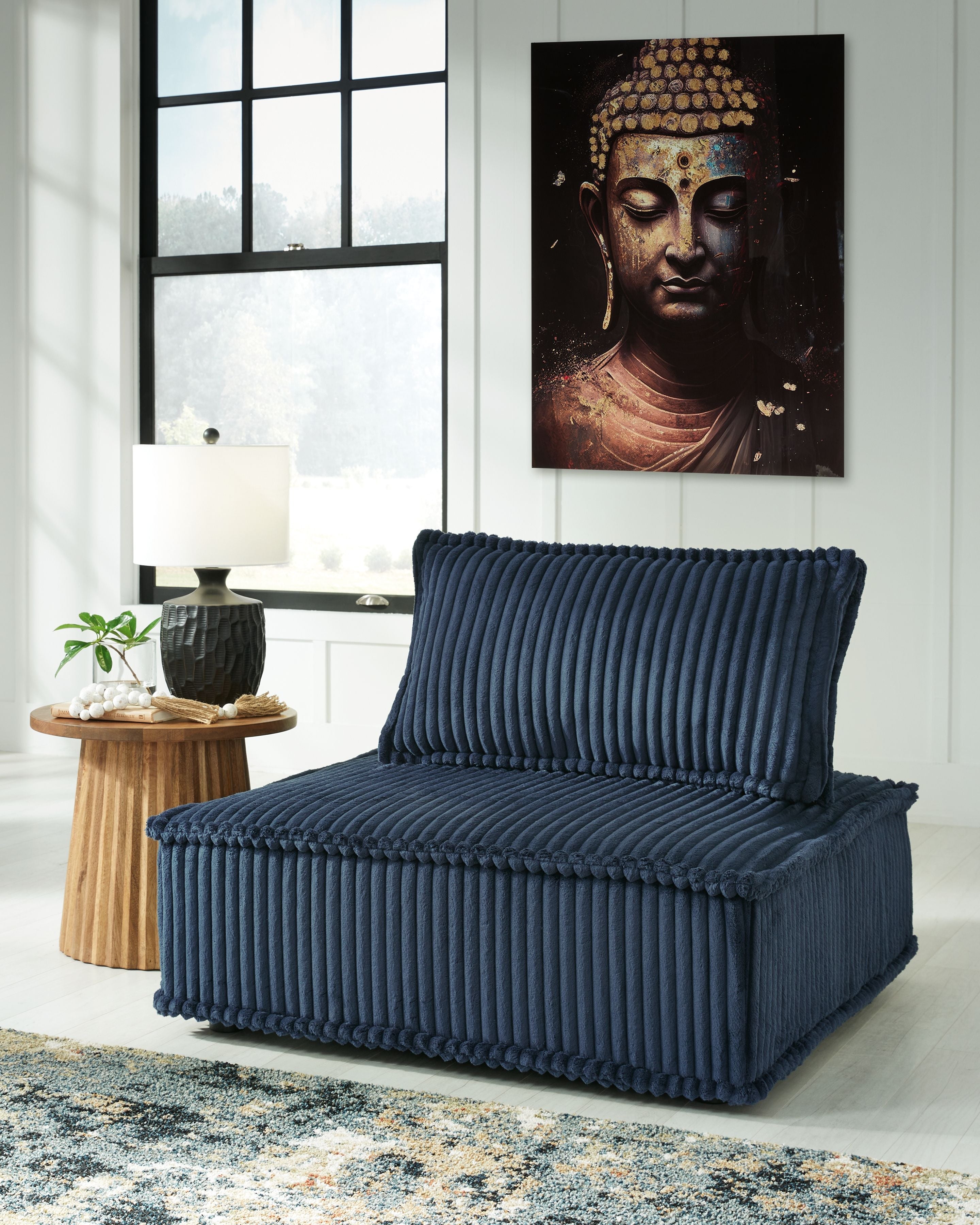 Blue ribbed accent chair with high back and thick padded seat cushions