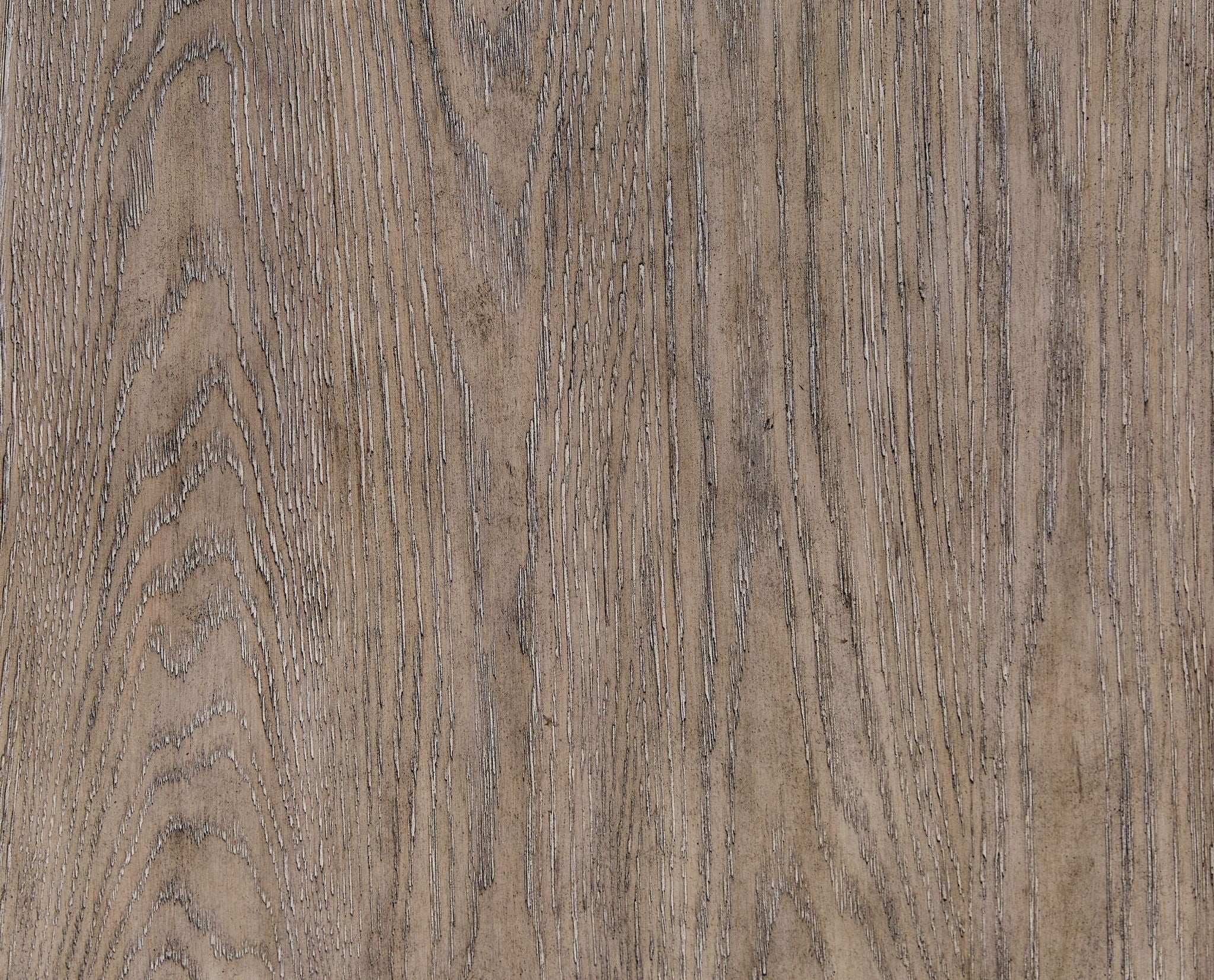Light brown wood paneling close-up with vertical grain and distressed finish