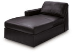 Black chaise with wide seat, padded backrest, squared arms, smooth upholstery