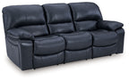 Power reclining sofa with dark navy leather-look upholstery and padded seat cushions