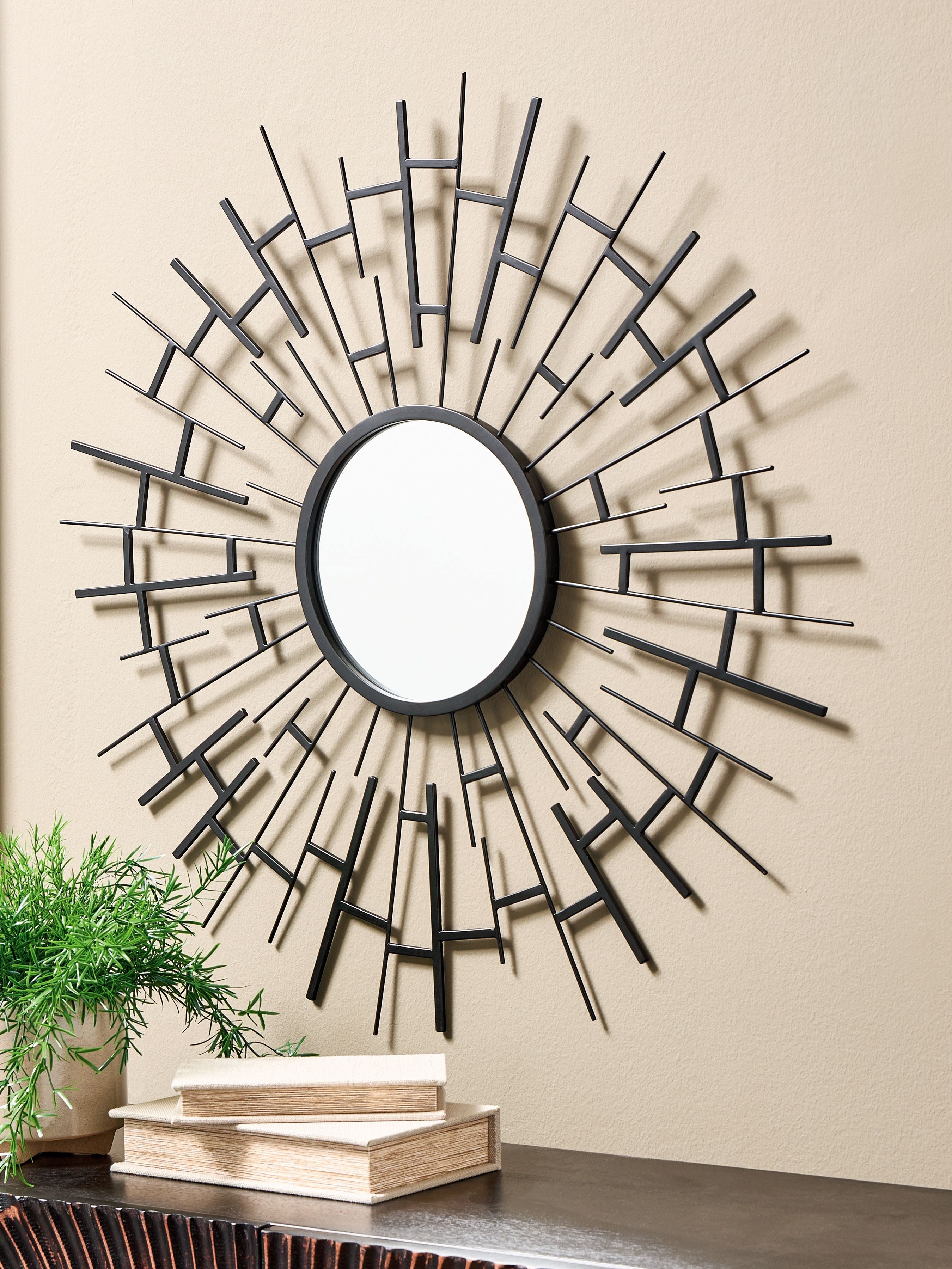 Garrenworth Accent Mirror with black sunburst frame and bright round reflective center