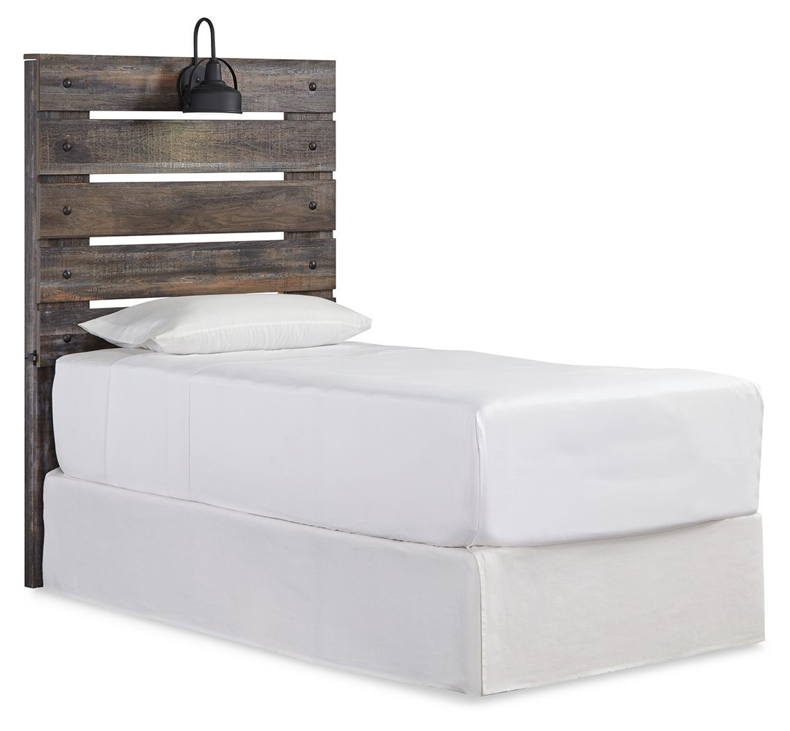 Dark brown panel headboard with horizontal slats and black light fixture, on bed