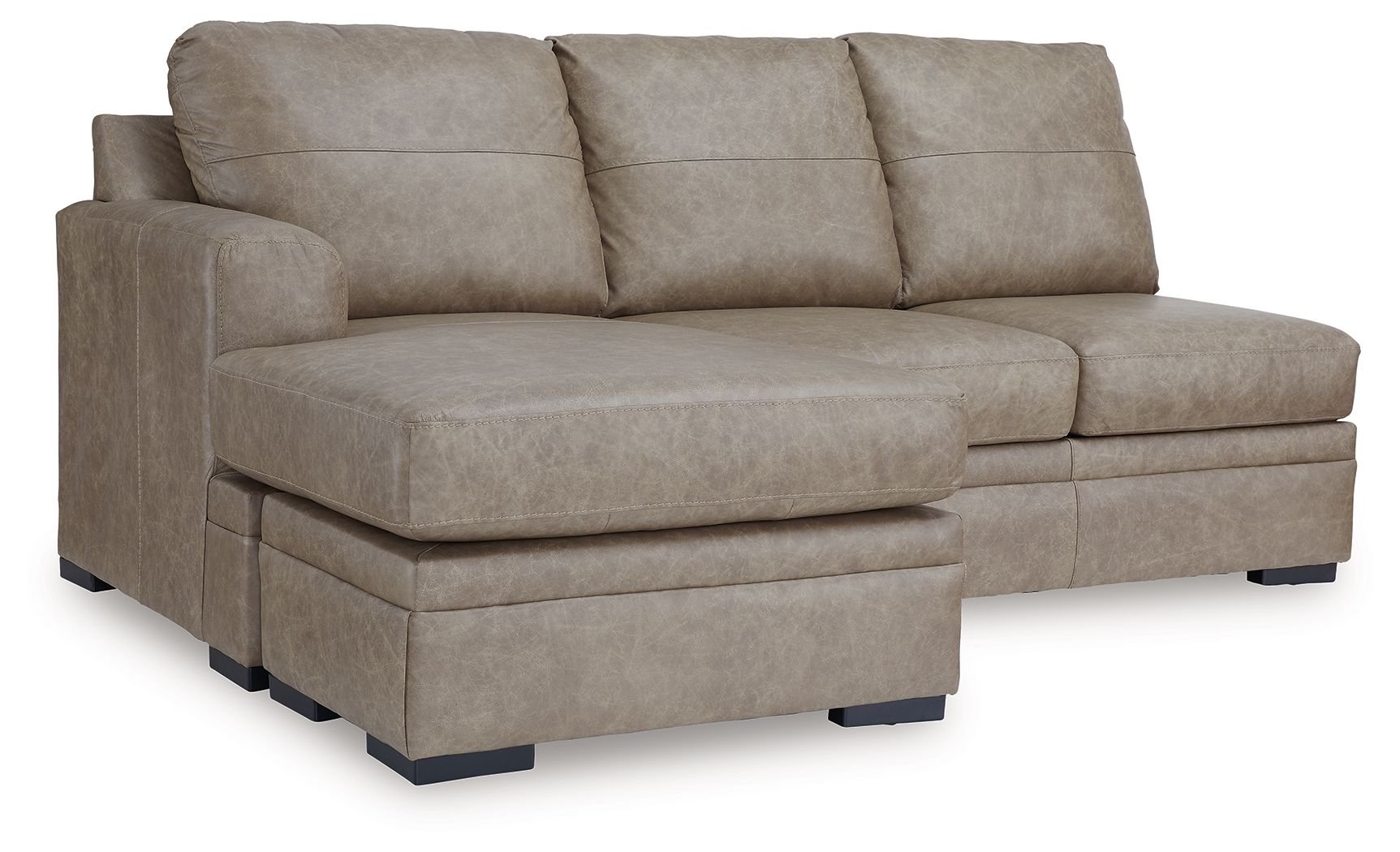 Beige fabric sofa chaise with padded back, boxy arms, and dark legs