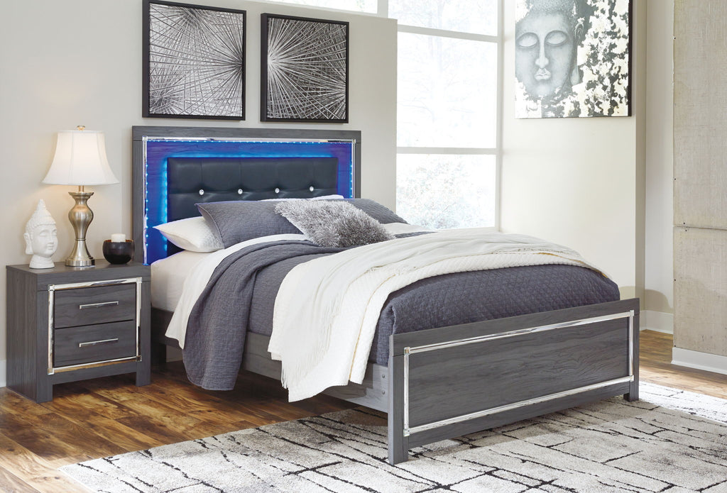 Gray panel bed with dark headboard and storage drawers, white-and-gray bedding, blue LED light