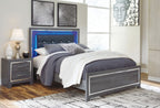 Gray panel bed with dark headboard and storage drawers, white-and-gray bedding, blue LED light