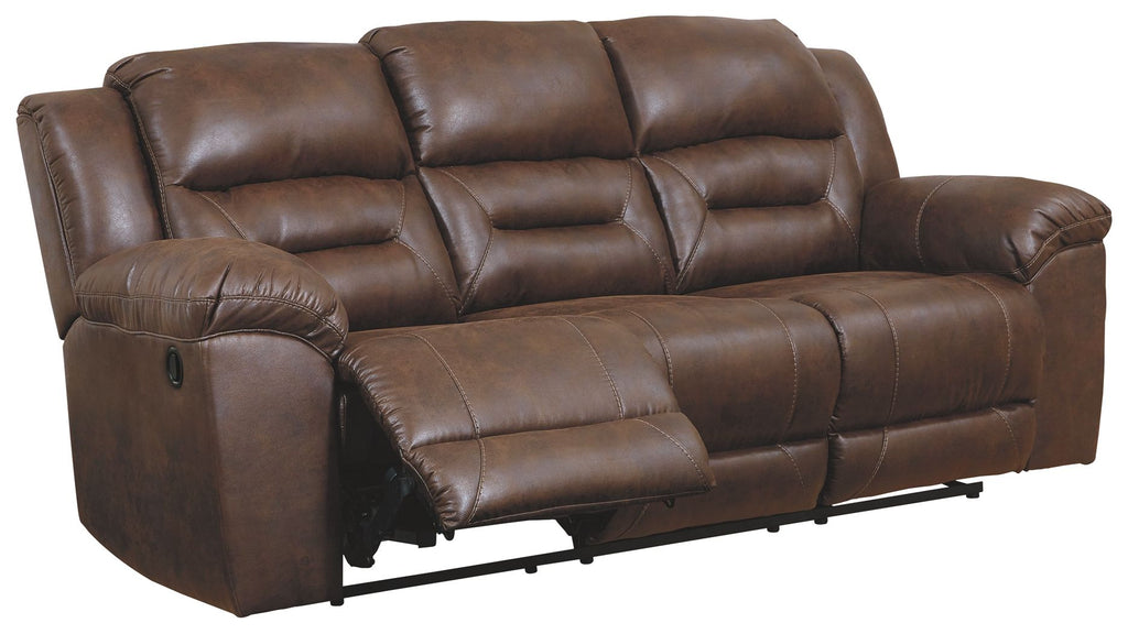 Chocolate brown reclining leather sofa with side control panel and curved padded arms