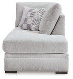 Gabyleigh corner chaise with light gray upholstered arm, throw pillow, and low legs