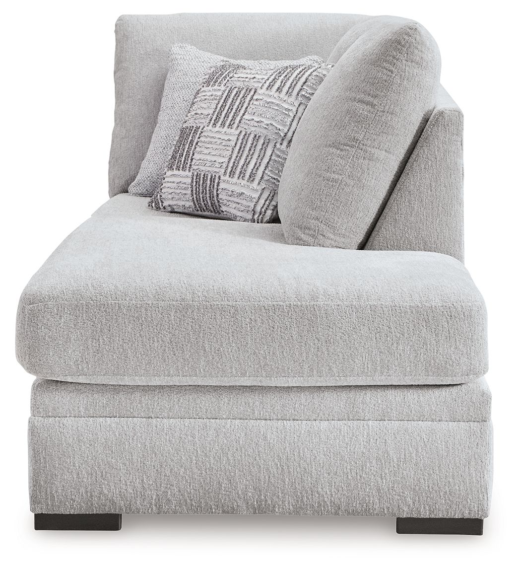 Gabyleigh corner chaise with light gray upholstered arm, throw pillow, and low legs