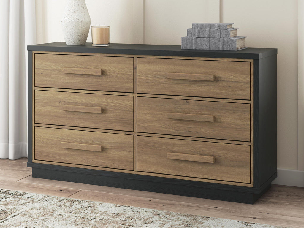 Six-drawer dresser with black finish and light wood drawers, bar pulls on each drawer