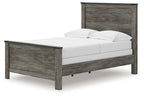 Gray panel bed with white mattress and pillows