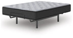 Gray mattress with quilted top and dark base on black metal legs