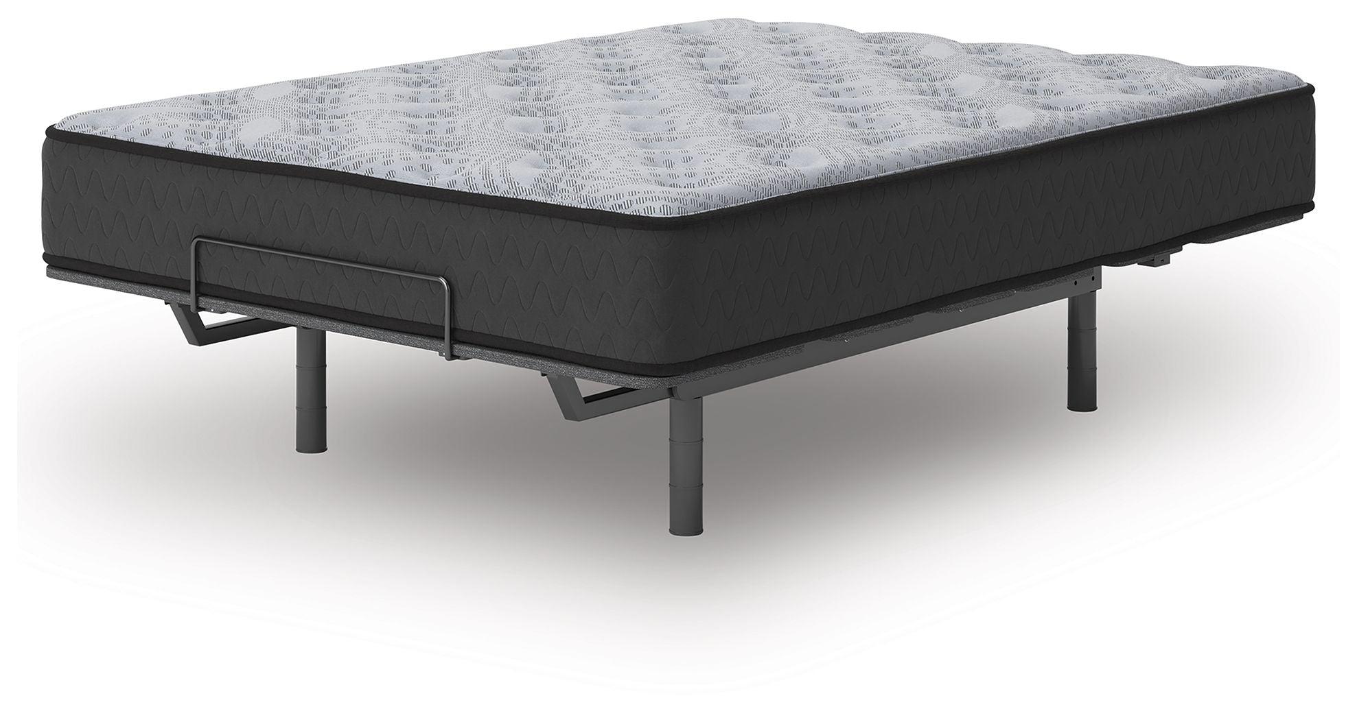 Gray mattress with quilted top and dark base on black metal legs