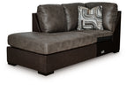 Fossil brown corner chaise with padded seat, boxed arms, and geometric throw pillows
