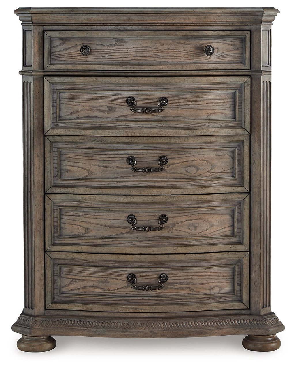 Light brown five-drawer chest with black metal knobs and decorative top panel molding
