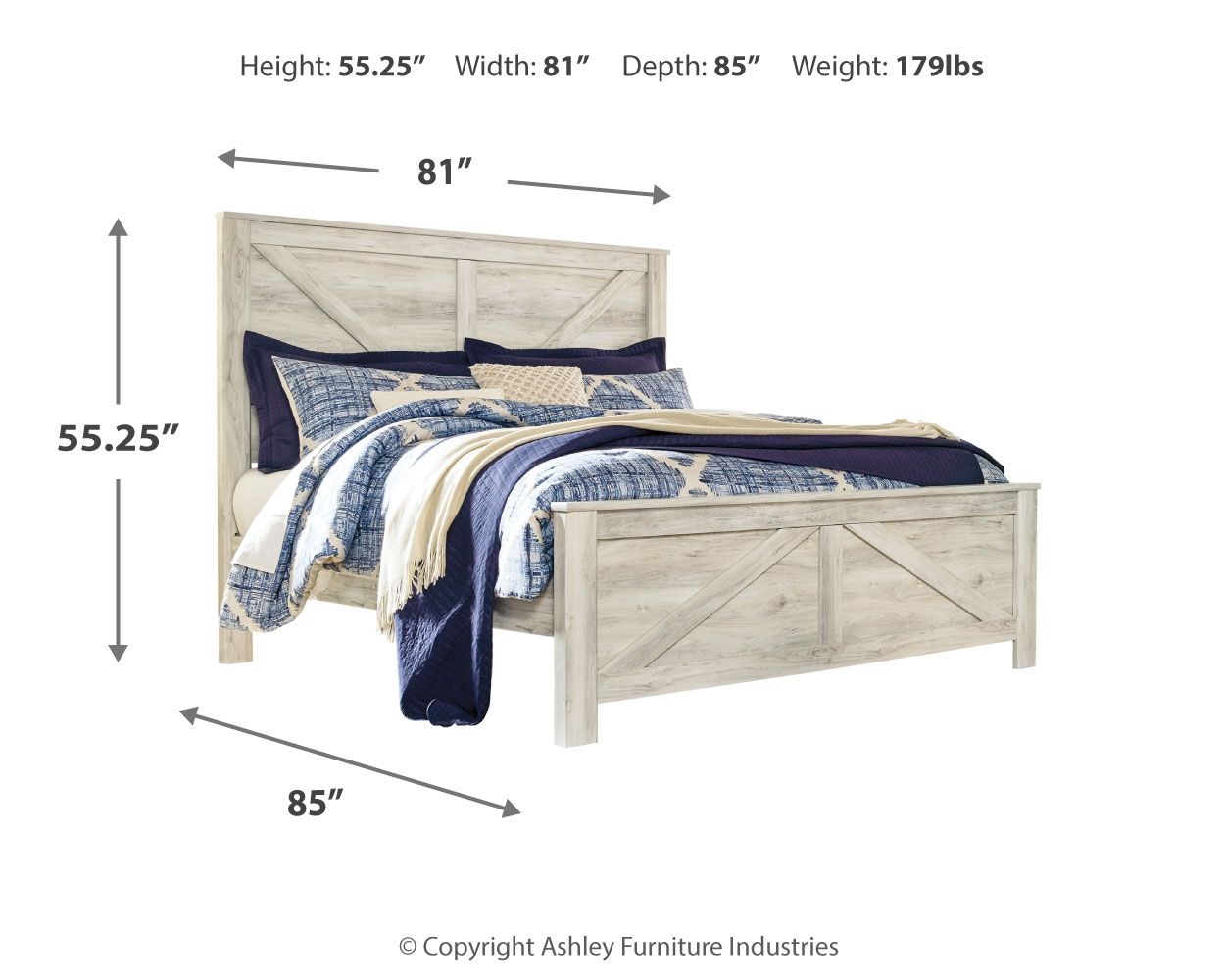 Beige crossbuck panel bed frame with blue-and-white comforter and throw