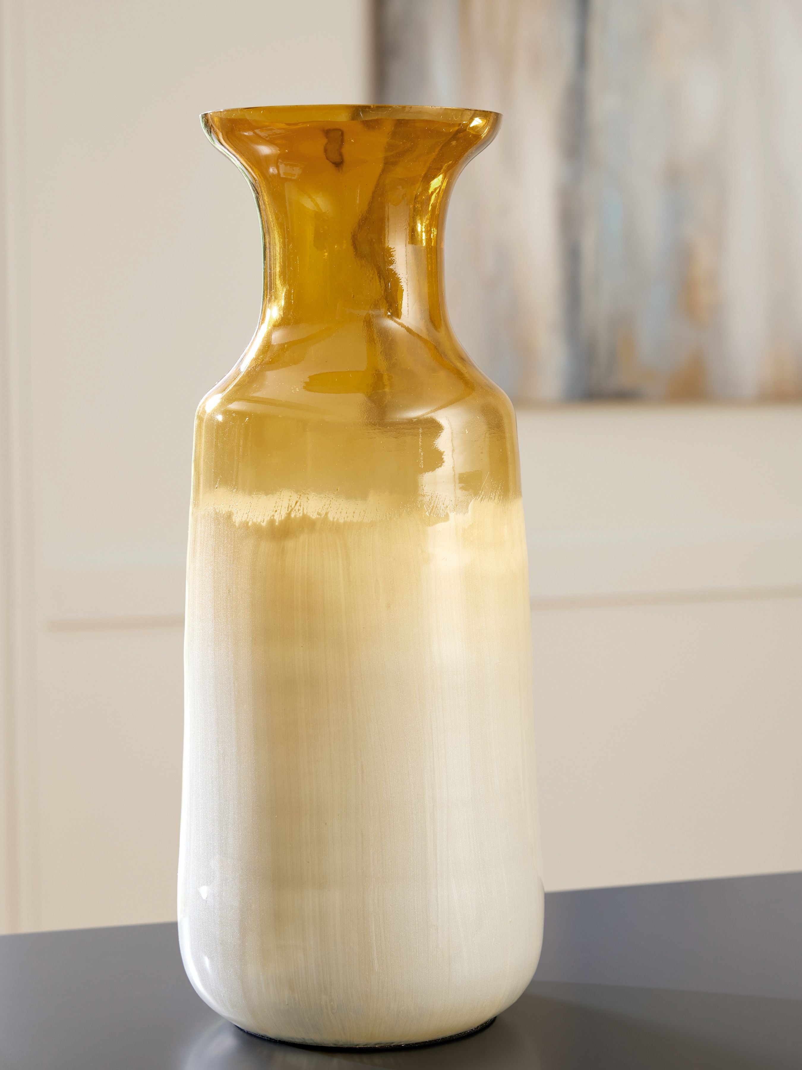 Amber-topped ivory ceramic vase with sculpted neck and wide flared rim