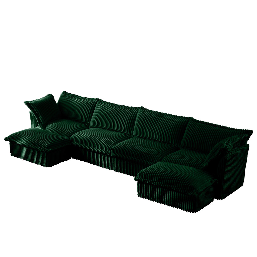 Green U-shape sectional sofa with chaise-style ottoman and ribbed throw cushions