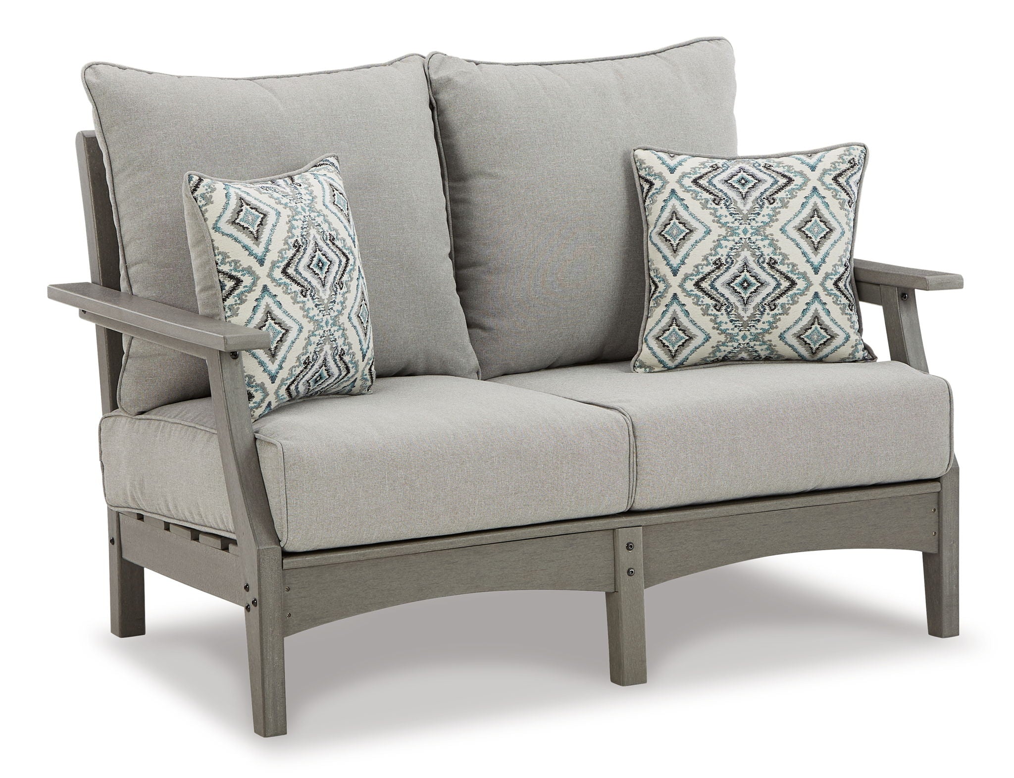 Gray outdoor loveseat with two accent pillows and thick padded armrests