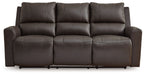 Boxmere dark brown power reclining sofa with three reclining sections and tufted backs