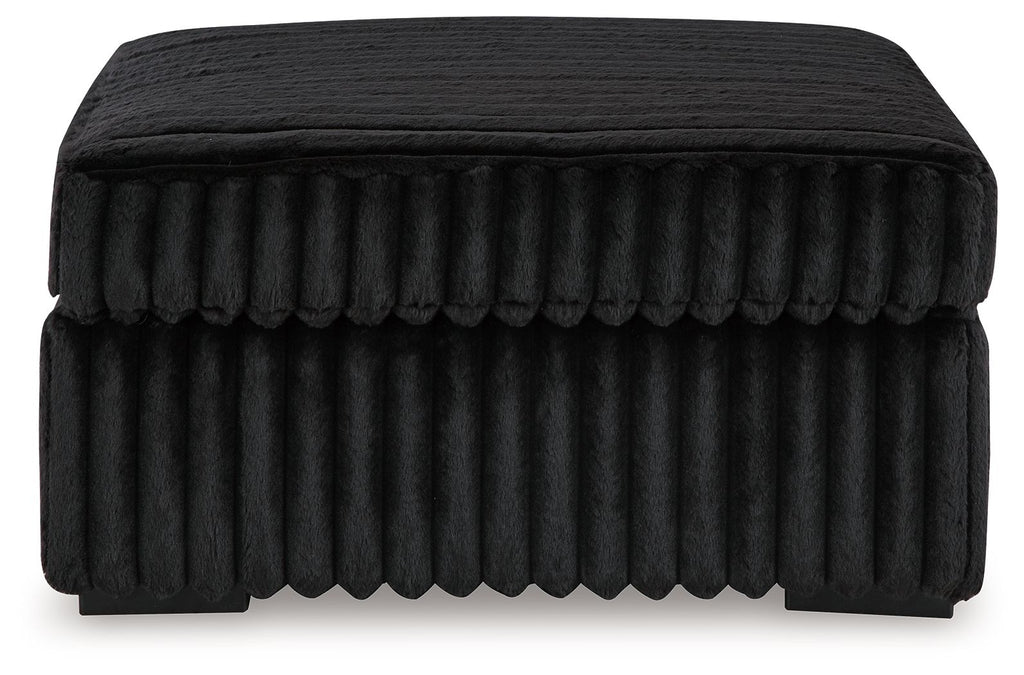 Oversized accent ottoman with ribbed fabric and rounded top, dark finish