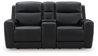 Black power reclining loveseat with console and adjustable headrest, close front view