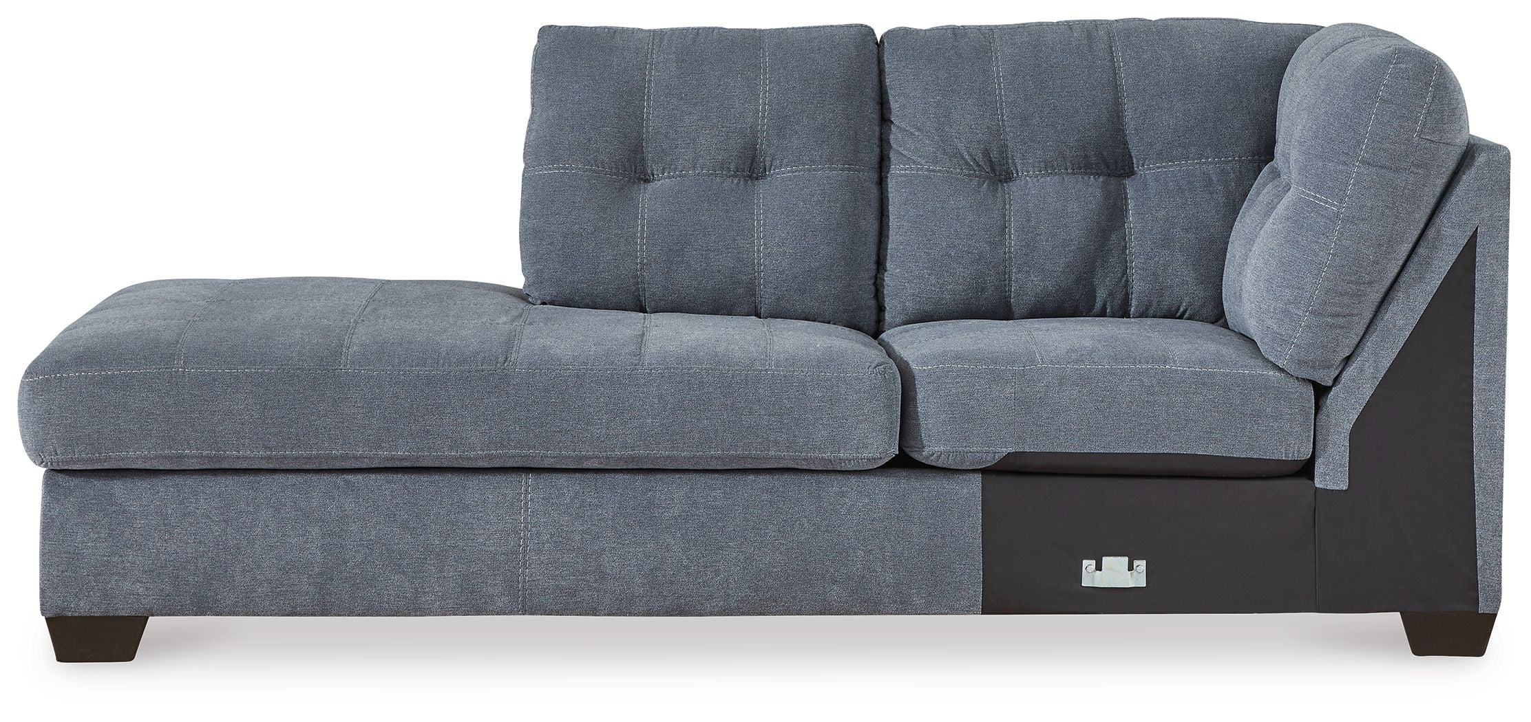 Blue denim corner chaise with tufted backrest, track arm, and dark wood legs