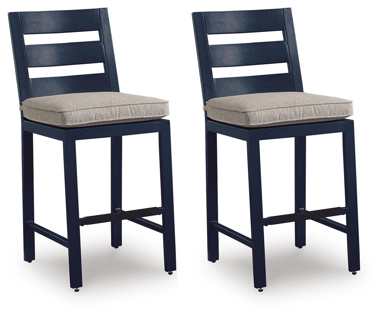 Set of 2 blue barstools with slatted backs and gray padded seats