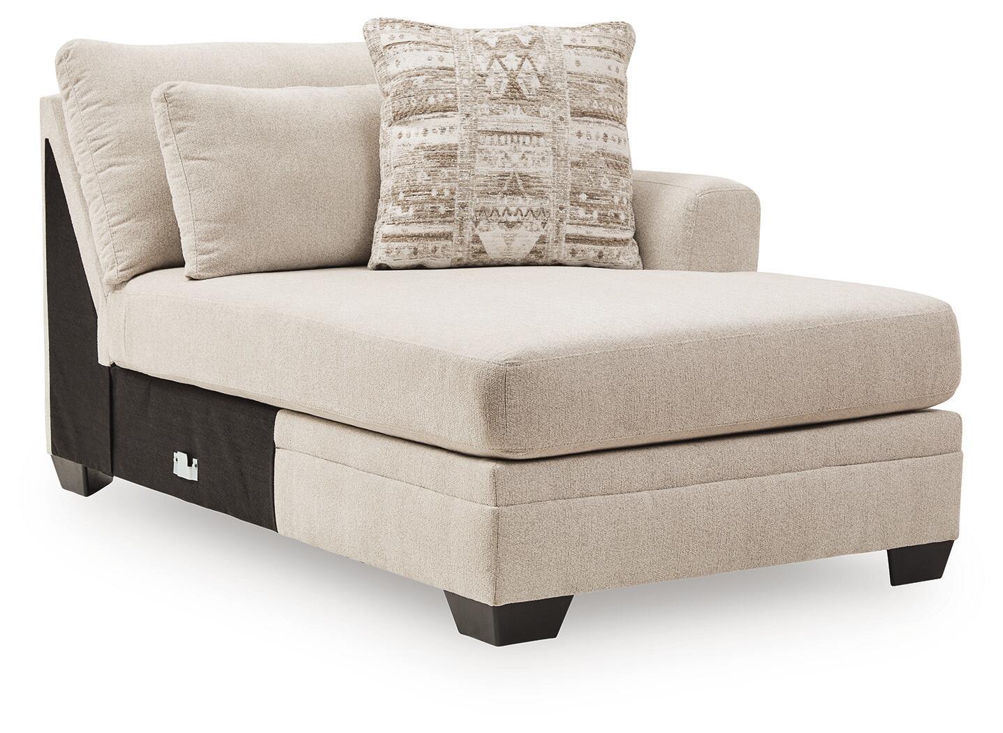 Beige corner chaise sofa section with square arm and fabric throw pillows