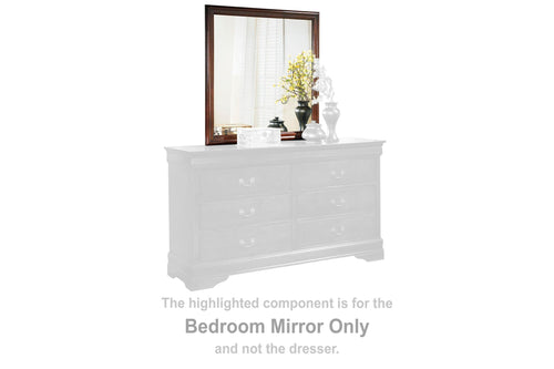 Bedroom mirror with reddish brown frame, reflecting tabletop and vase.