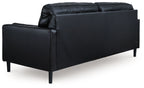 Onyx sofa side view with boxy armrests, thick cushions, and dark tapered legs