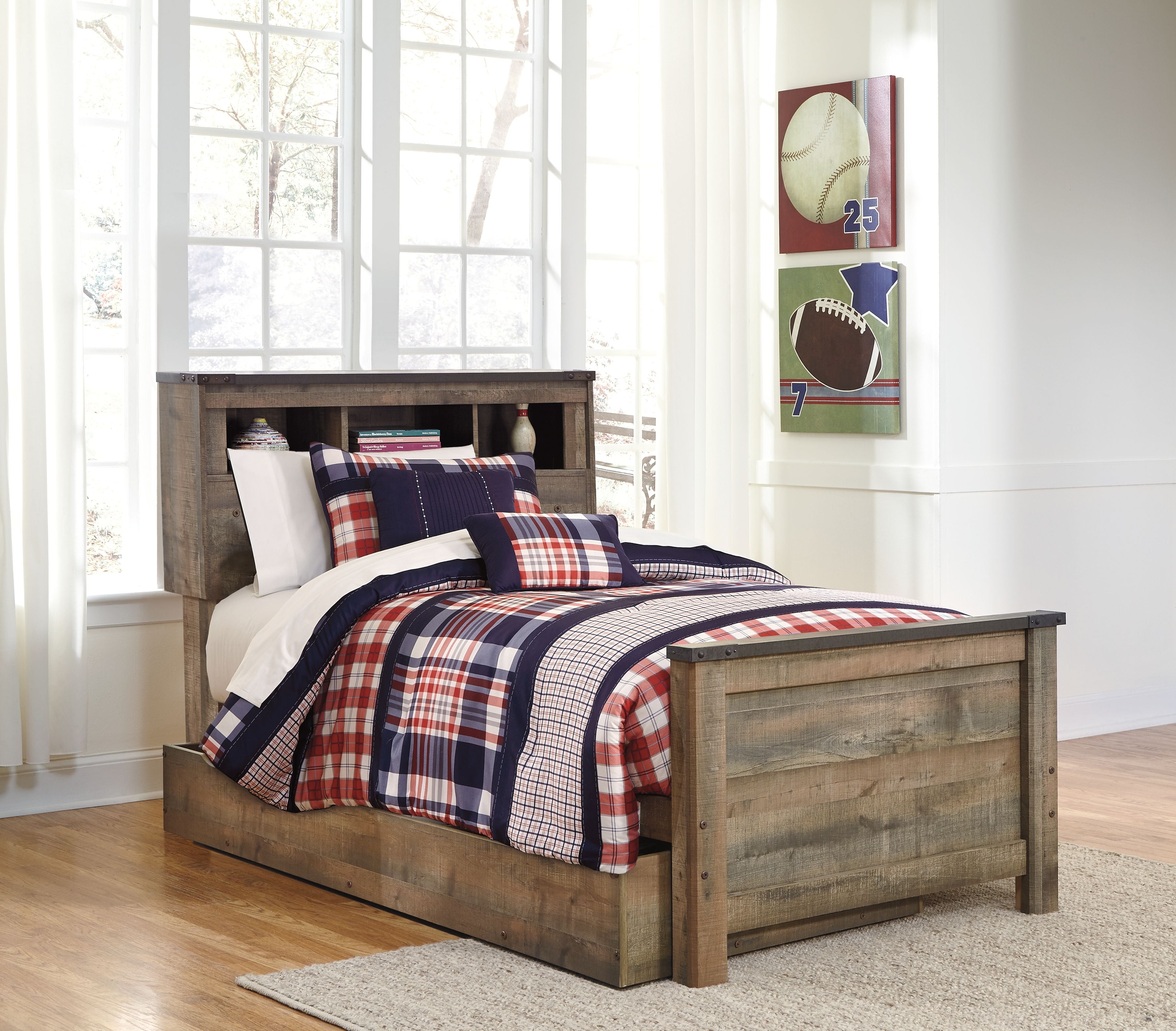 Twin bookcase bed with storage drawer, brown wood frame and plaid duvet set
