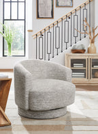 Wardsor swivel chair in stone fabric, rounded arms and circular swivel base.