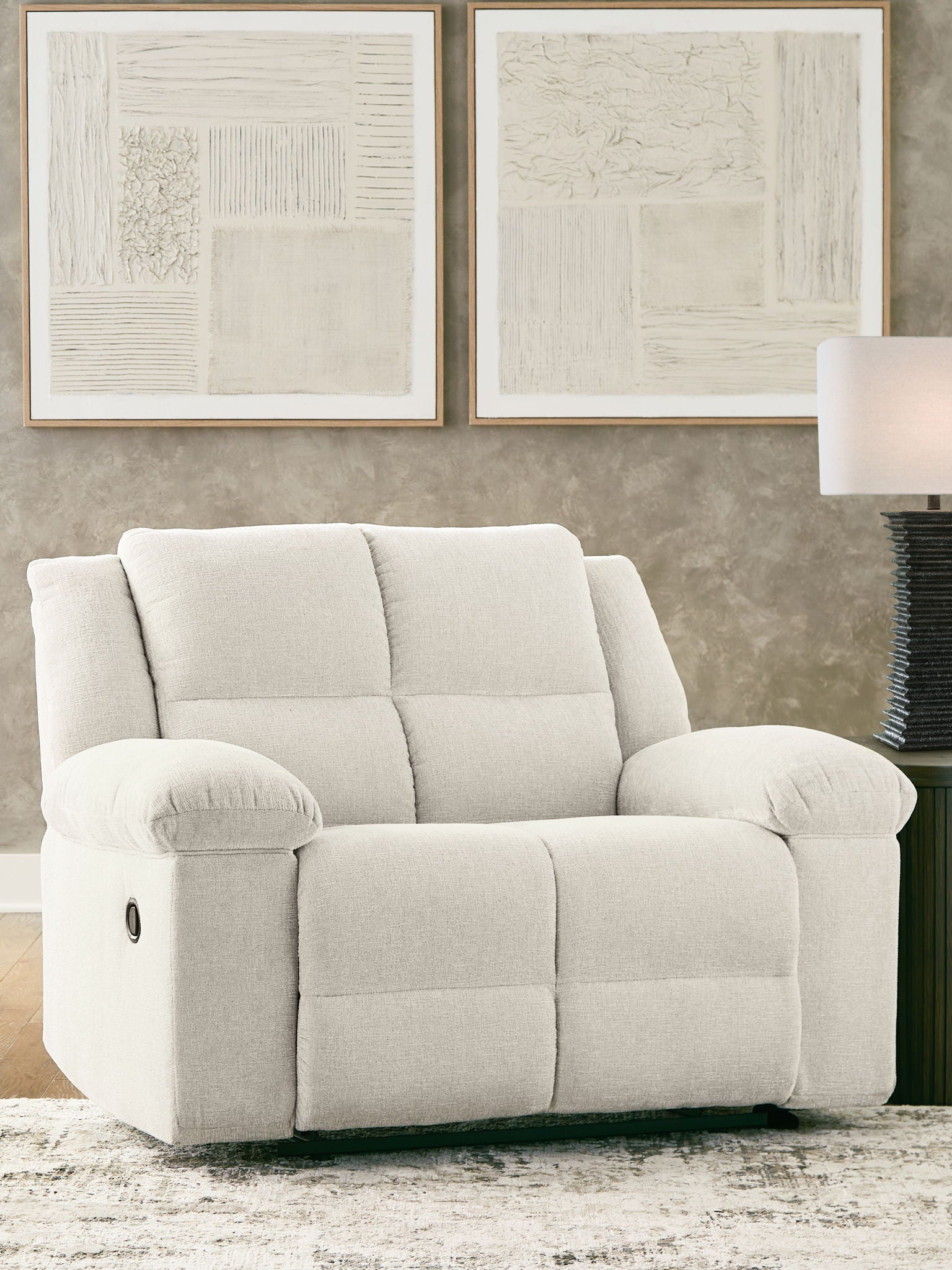 Recliner chair, light beige, padded arms and reclined seat, front view